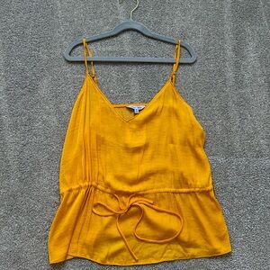 Flowy orange blouse with tie